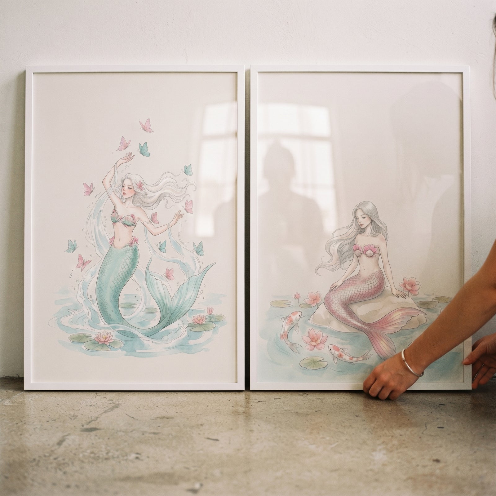Ethereal flowing hair mermaid wall art set of 2 featuring pastel illustrations with butterflies, koi fish, and water lilies.