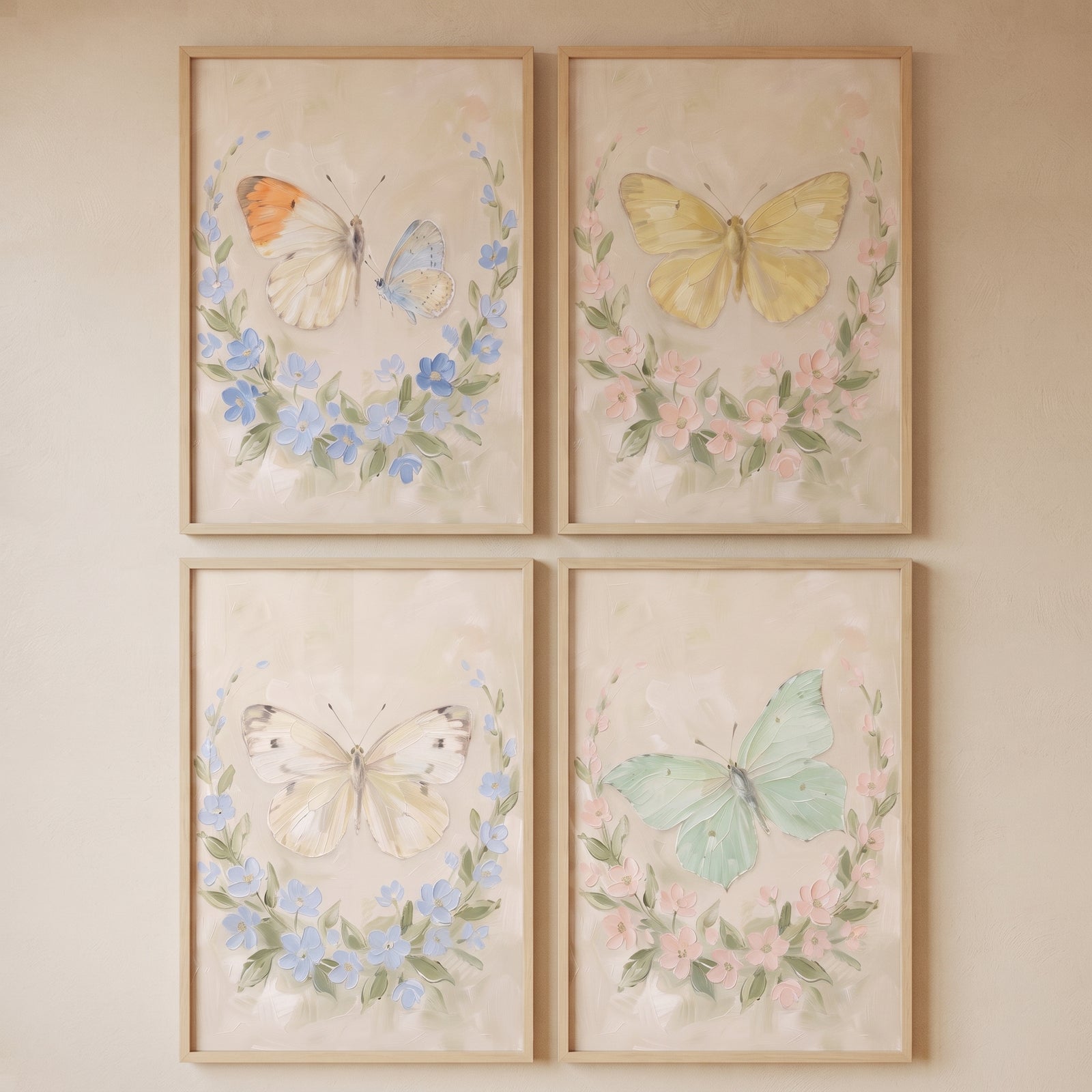 Ethereal garden wreath butterfly wall art set of 4 features pastel butterflies within soft blue and pink floral wreaths.