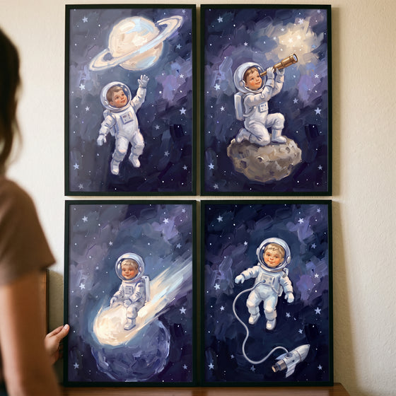 Ethereal indigo baby astronaut wall art set of 4 showing a child in a space suit exploring stars, planets, and a comet.