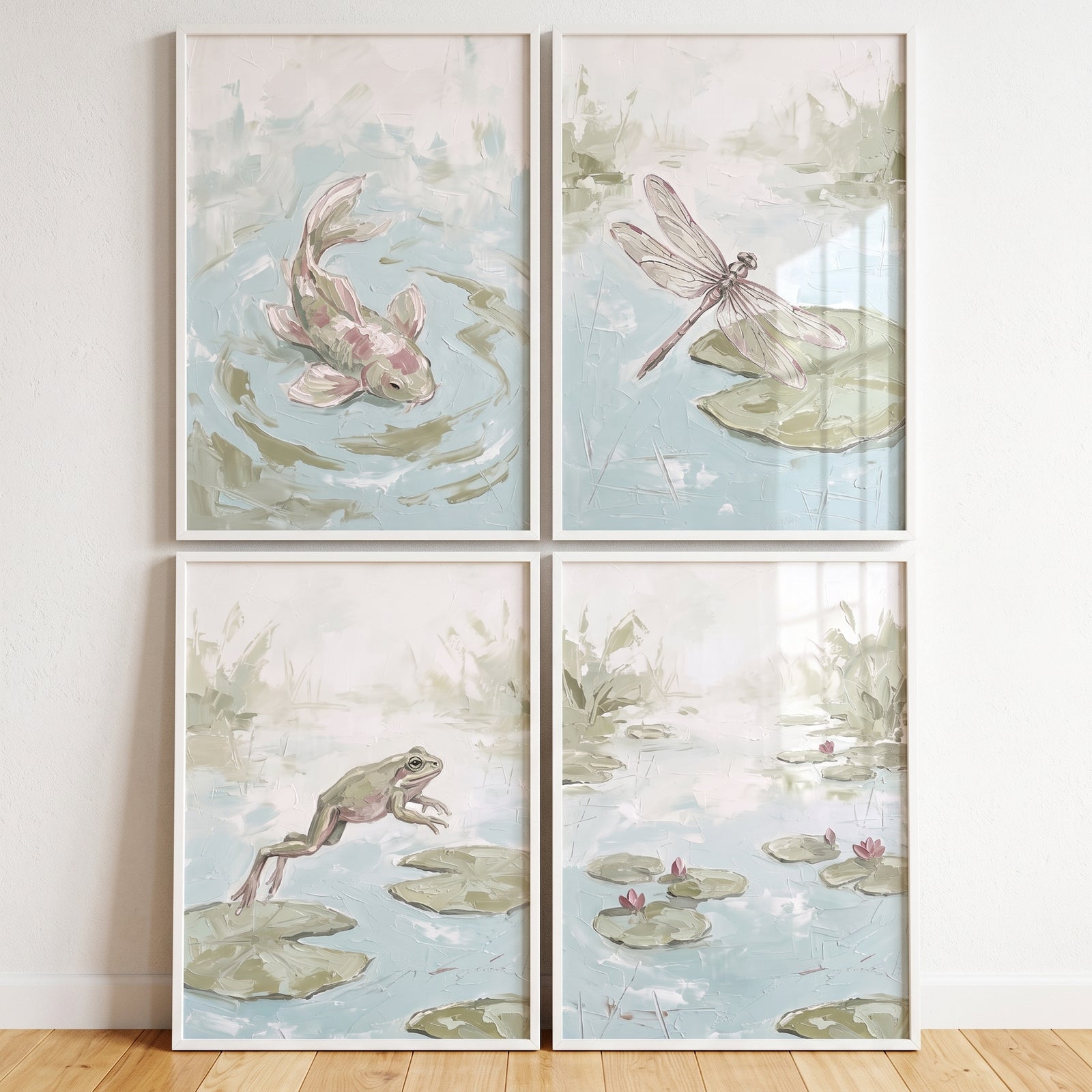 Ethereal sage pond wall art set of 4 features a fish, dragonfly, leaping frog, and lily pads in soft green and blue tones.