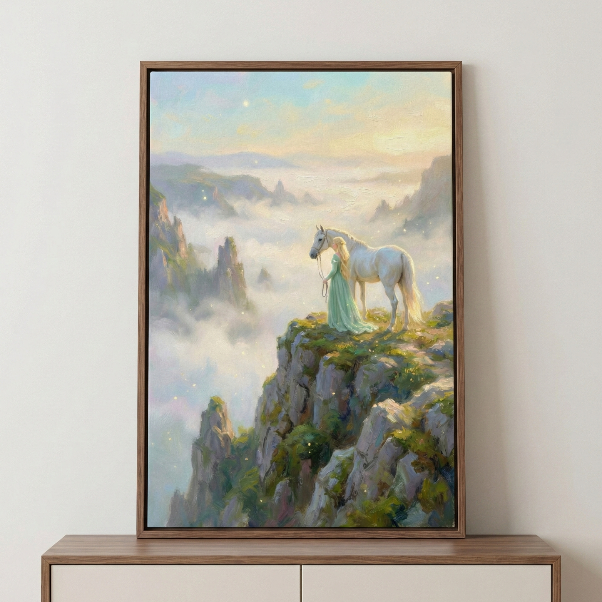 A framed painting depicts a serene scene of a woman in a flowing green dress standing beside a white horse on a rocky cliff. The landscape is enveloped in mist, with distant mountains visible under a soft, glowing sky.