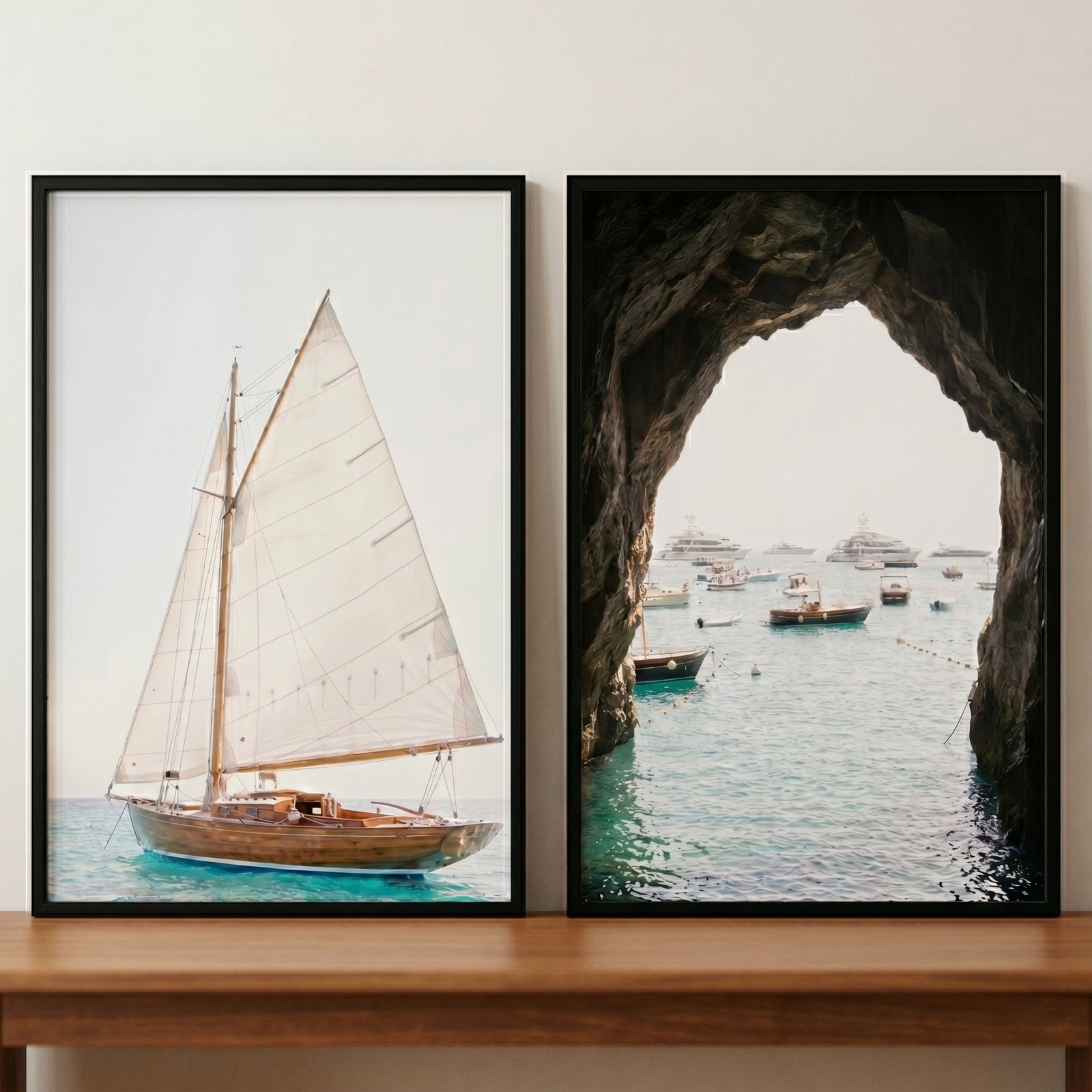 European summer mediterranean boat wall art set of 2 with a wooden sailboat and a view from a sea cave.