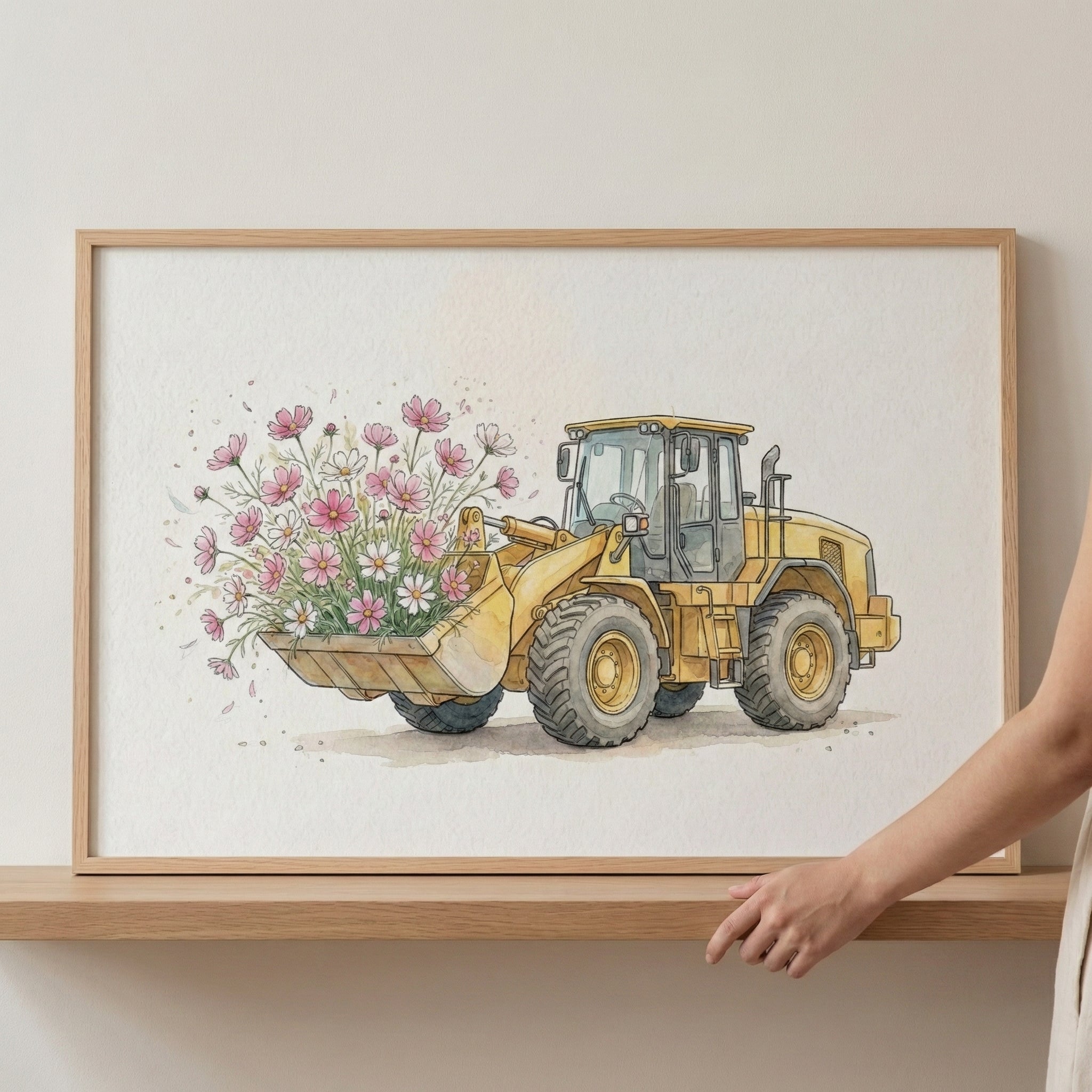Playful watercolor of a yellow construction loader filled with pink cosmos and white daisies, framed in light wood and propped on a minimalist wooden shelf.