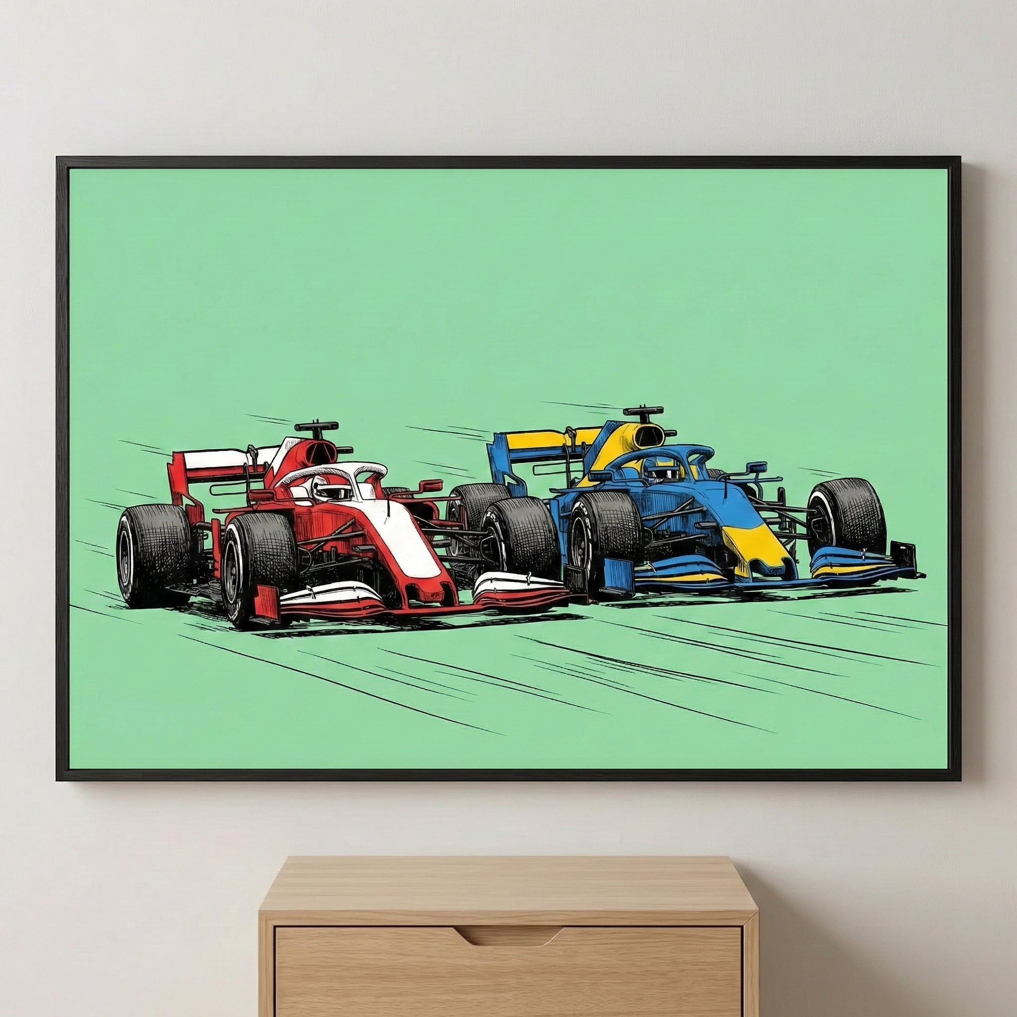 Framed artwork depicting two Formula 1 race cars—one red and white, the other blue and yellow—racing side by side on a mint green background. The illustration captures high-speed intensity with motion lines, and the print is displayed above a light wood cabinet.