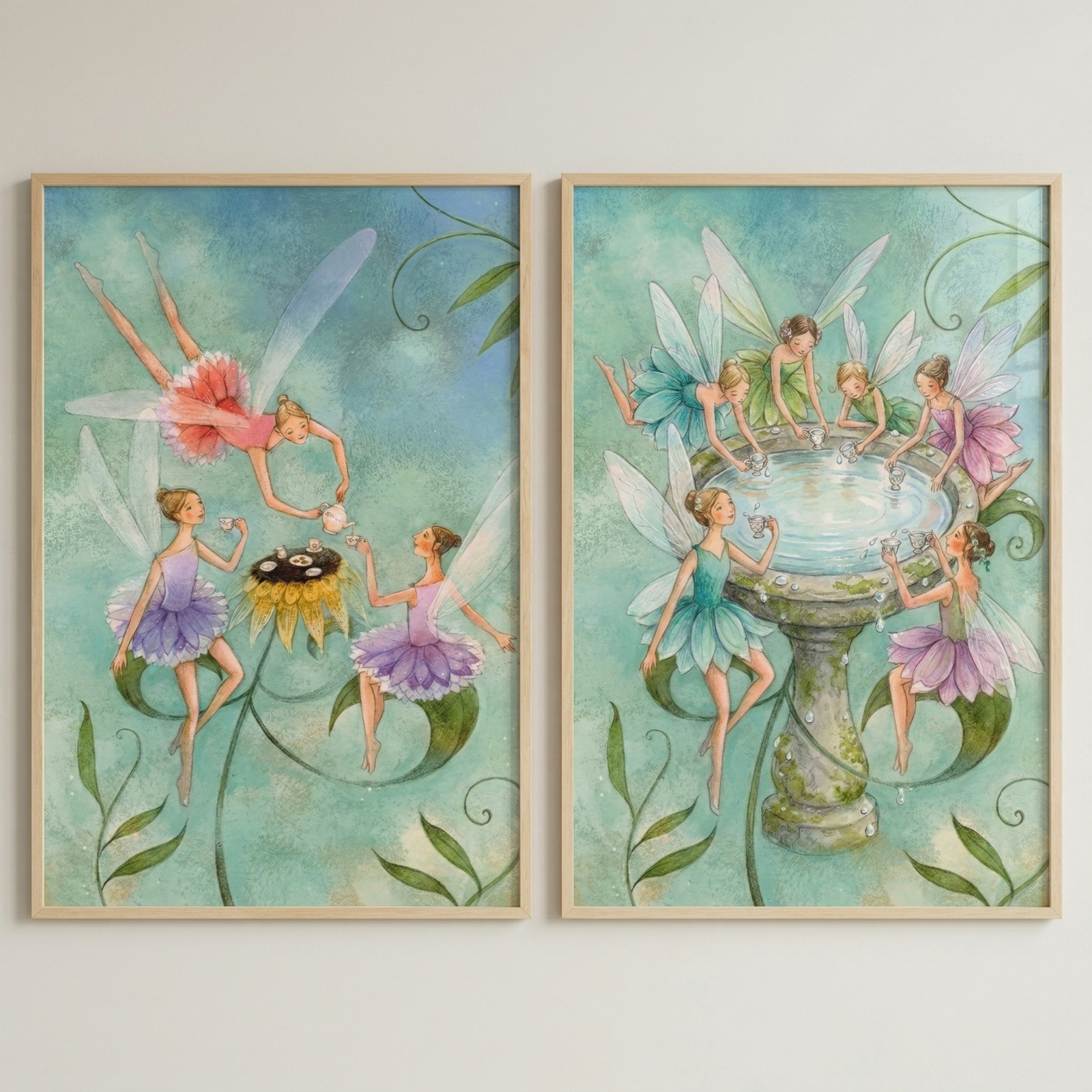 Two vertical framed illustrations hang side-by-side, depicting whimsical scenes with small winged figures. In the left illustration, three figures with delicate wings and colorful skirts interact; one pours from a small pot into a cup while another sits on a sunflower. In the right illustration, six similar figures gather around a stone garden fountain, using small cups to collect water. The art features a soft, ethereal style with pastel hues against a textured teal background.