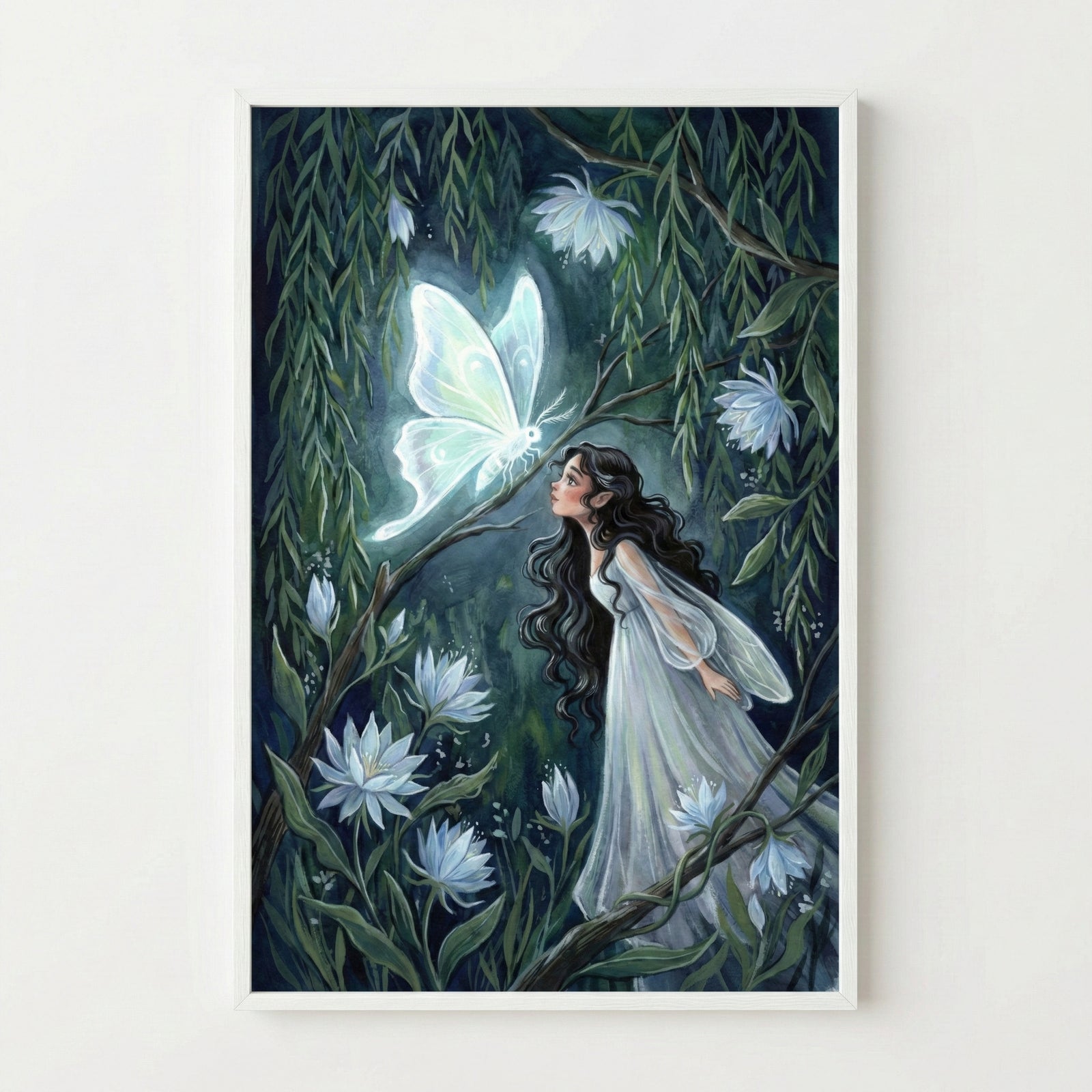 A framed vertical illustration of a young woman with long, dark, wavy hair and pointed ears, wearing a flowing, translucent white gown. She is looking up with an expression of wonder at a large, luminous, white butterfly resting on a tree branch. The scene is set in a dark, magical forest at night, surrounded by lush green willow leaves and several large, glowing, star-shaped white flowers. The light from the butterfly and flowers softly illuminates the scene, creating a whimsical and ethereal atmosphere.