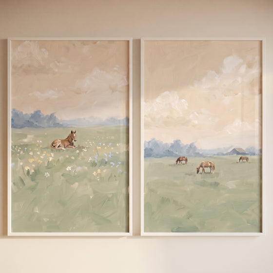 Farmhouse sage meadow horse wall art set of 2 with a horse in flowers and others grazing by a barn under beige skies.