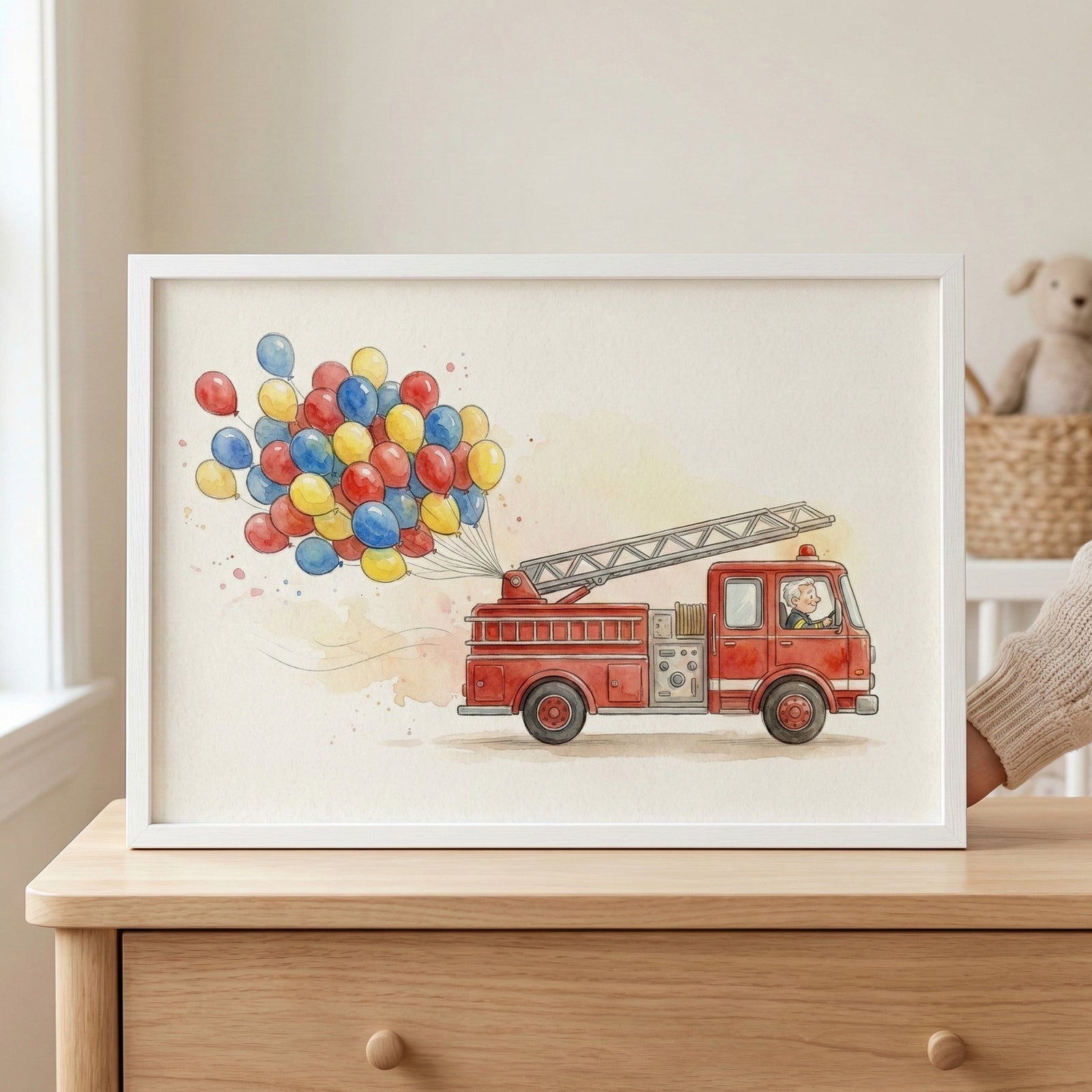 Framed illustration of a bright red fire truck driven by a cheerful firefighter, with a colorful burst of balloons trailing behind it. The ladder on top adds a realistic element, while the floating balloons bring whimsy and joy.