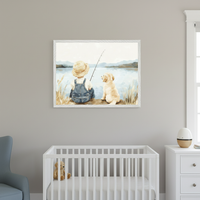 Nursery with a white crib, blue armchair, and white dresser. A framed painting of a child fishing with a golden retriever by a lake hangs centered above the crib.