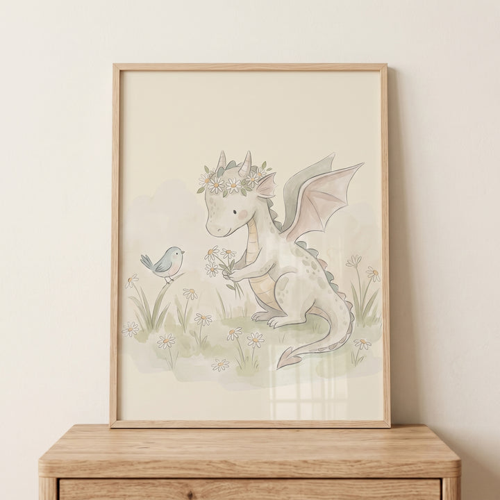 Framed floral crown baby dragon wall art shows a green dragon and blue bird in a watercolor meadow of daisies.