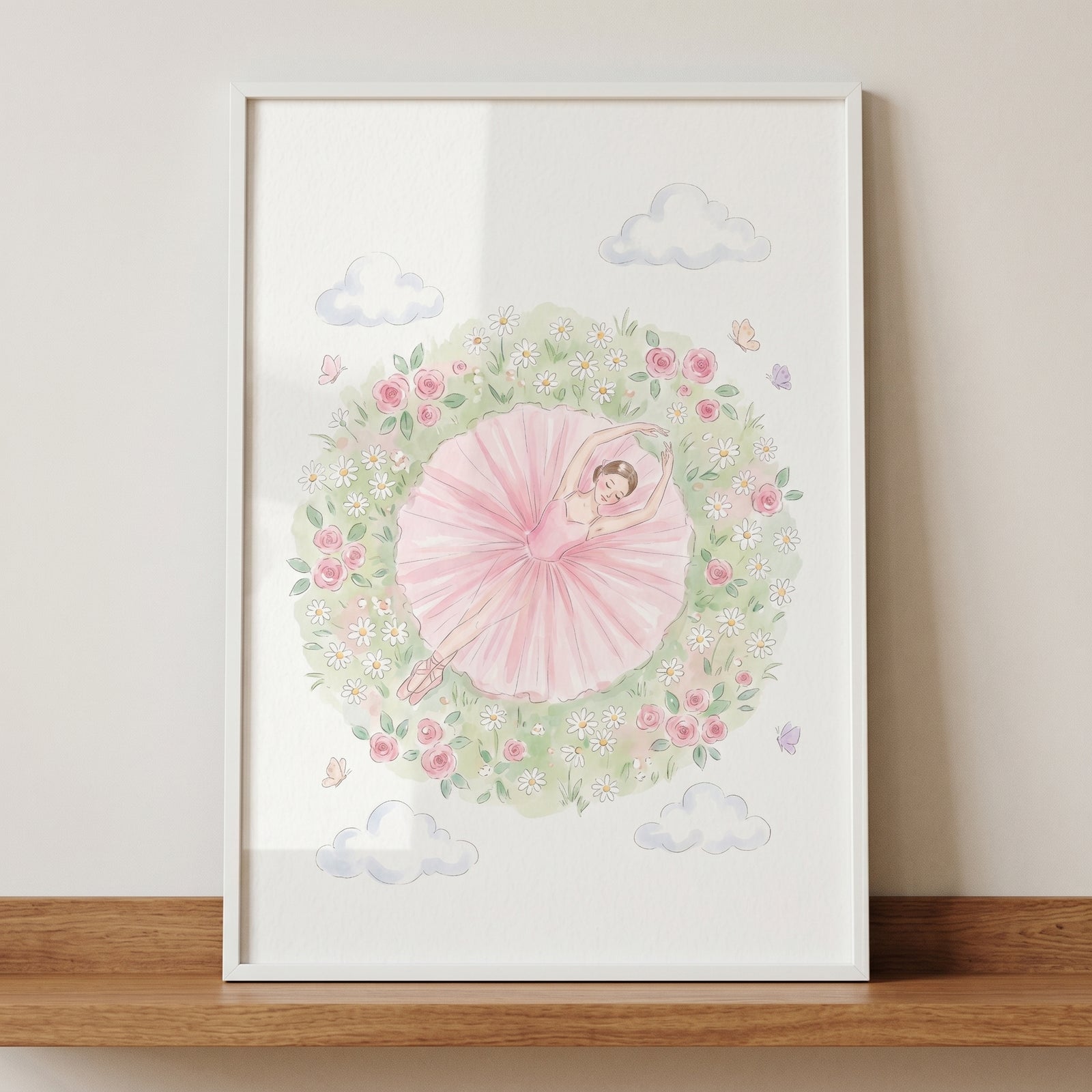 Watercolor floral meadow ballerina wall art featuring a dancer in a pink tutu within a circle of roses and clouds.