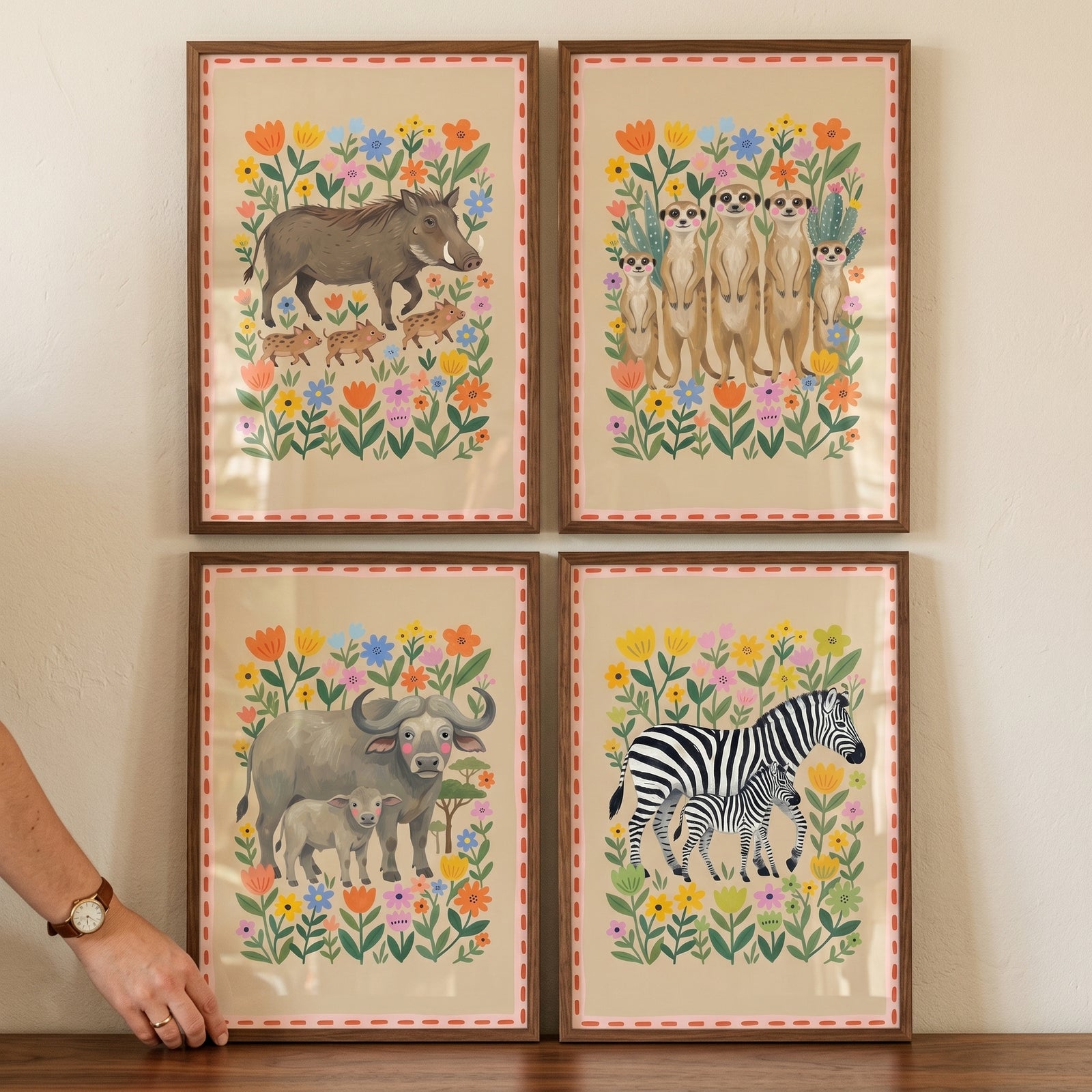 Floral meadow safari animals wall art set of 4 featuring a warthog, meerkats, water buffalo, and zebra in wood frames.