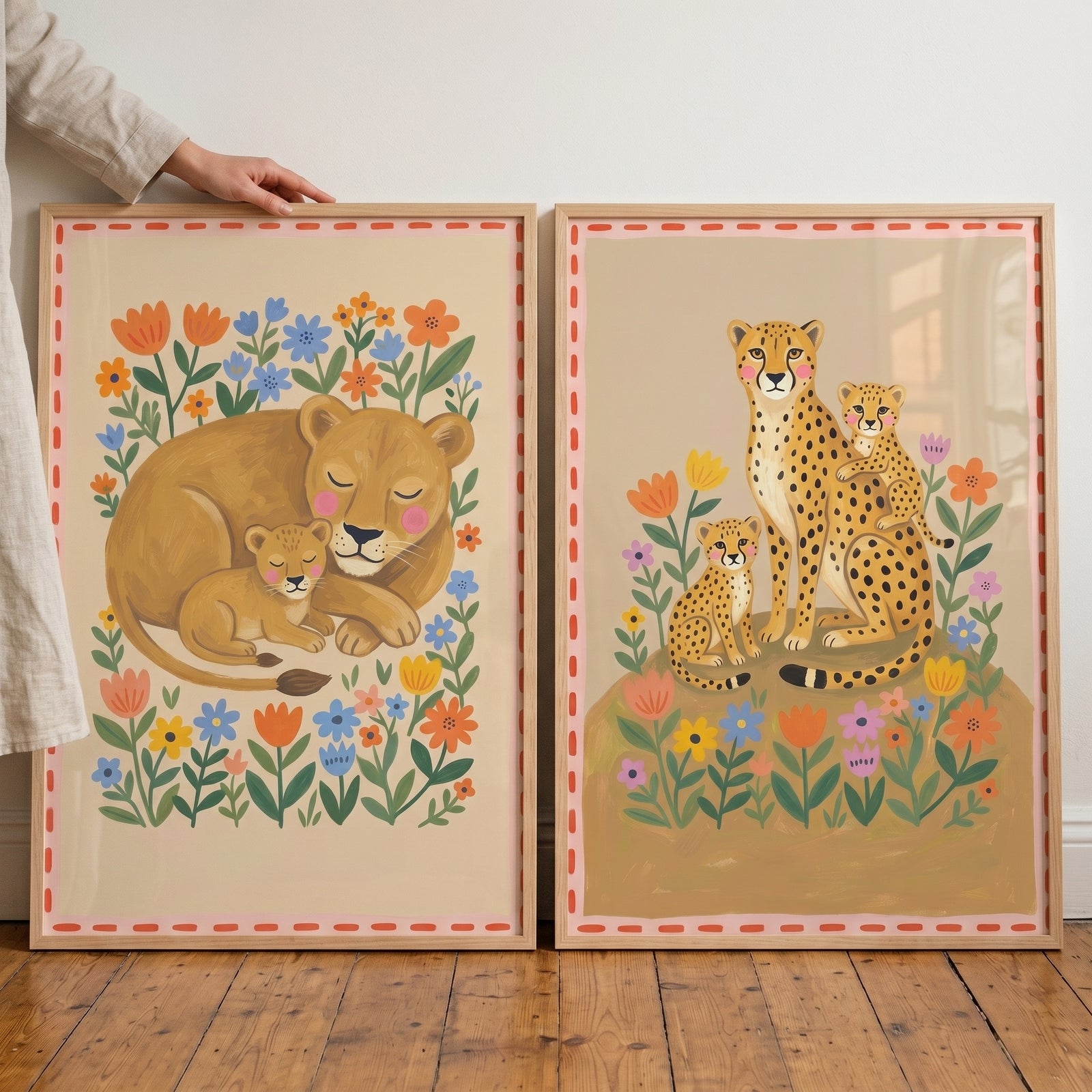 Folk garden big cat wall art set of 2 featuring a sleeping lioness and a cheetah family surrounded by colorful flowers.