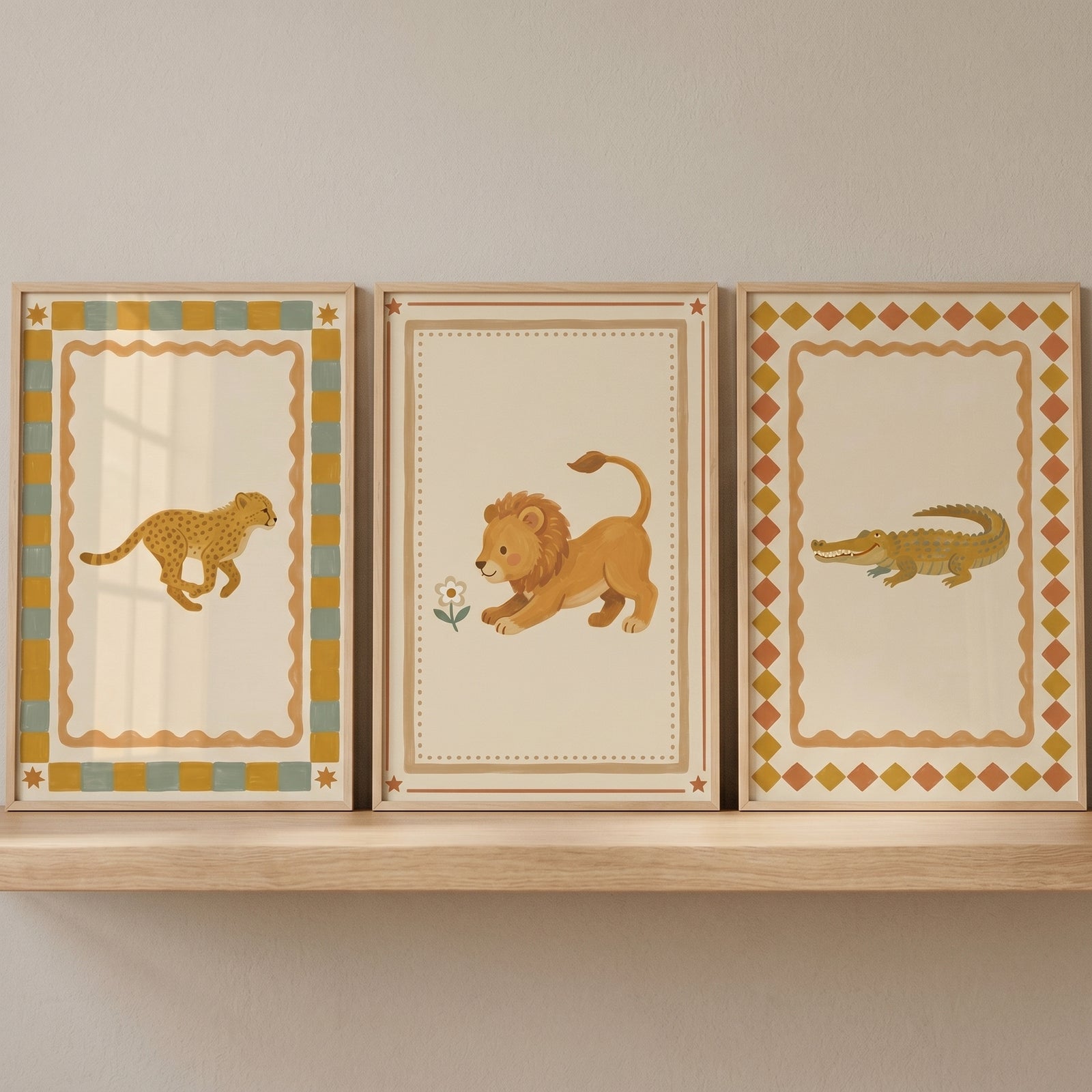 Folk safari animal wall art set of 3 featuring a cheetah, a lion, and a crocodile in wood frames on a shelf.
