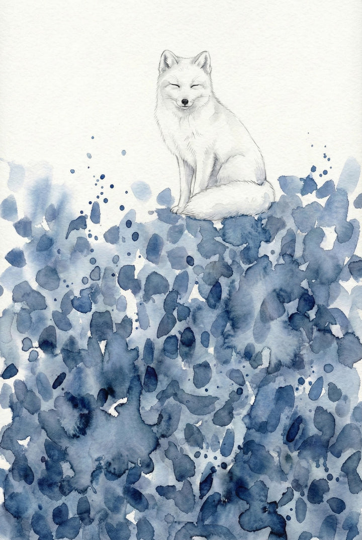 A watercolor illustration of an arctic fox sitting calmly with its eyes closed, blending softly into a background of cool blue and indigo splashes. The fox's white fur and peaceful expression contrast gently against the textured, abstract ground below.
