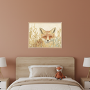 Modern kid's bedroom with a wooden bed. A framed illustration of a fox peeking through golden grass hangs above the bed on a terracotta wall. Two nightstands with lamps flank the bed, and a fox plush toy sits on the bed.