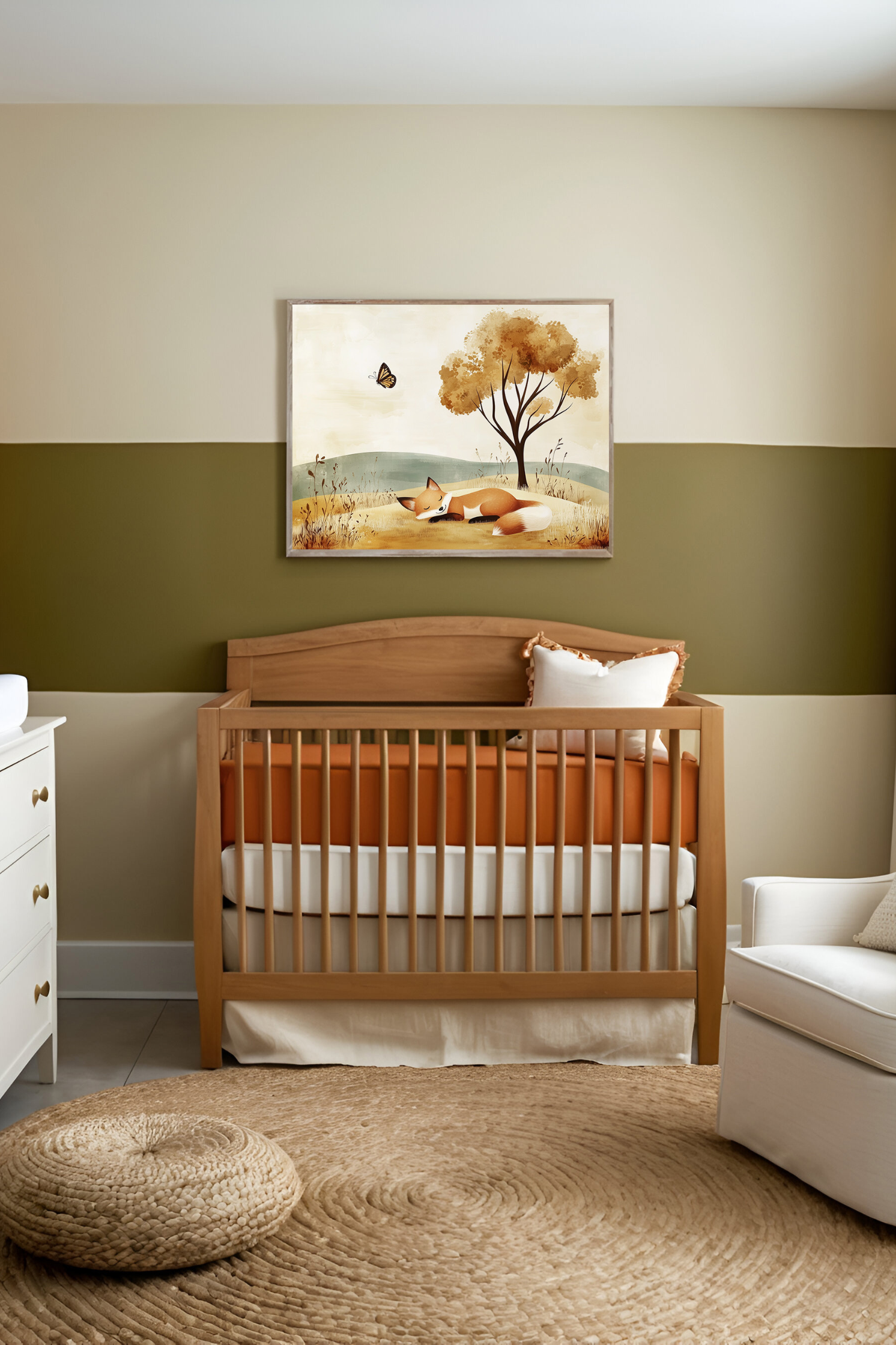 A cozy nursery featuring a wooden crib with soft, rust-colored bedding and neutral accents. Above the crib hangs a gentle illustration of a sleeping fox beneath a golden tree, complementing the room’s earthy, calming decor.