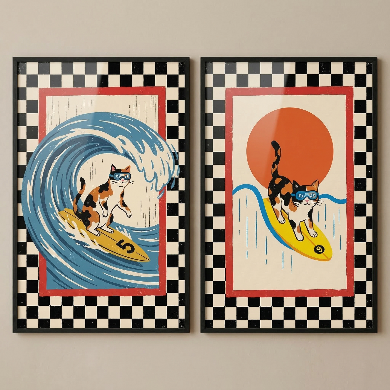 Two rectangular framed graphic artworks are displayed side-by-side against a neutral wall. Both pieces feature a wide black and white checkered border surrounding a red rectangular frame that encloses a central illustration.

The artwork on the left depicts a calico cat with patches of orange, black, and white fur wearing blue goggles. The cat is balanced on a yellow surfboard marked with the number "5" in black. It is surfing inside the barrel of a large, stylized blue wave with white foam crests.

