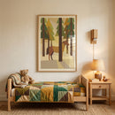 Teddy bear on a bed with a quilt under geometric woodland brown horse wall art next to a wooden nightstand and lamp.