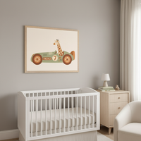 Modern nursery with a white crib, light wood dresser, and cream armchair. A large framed illustration of a cartoon giraffe driving a green race car with '7' and 'FACALE' hangs above the crib.