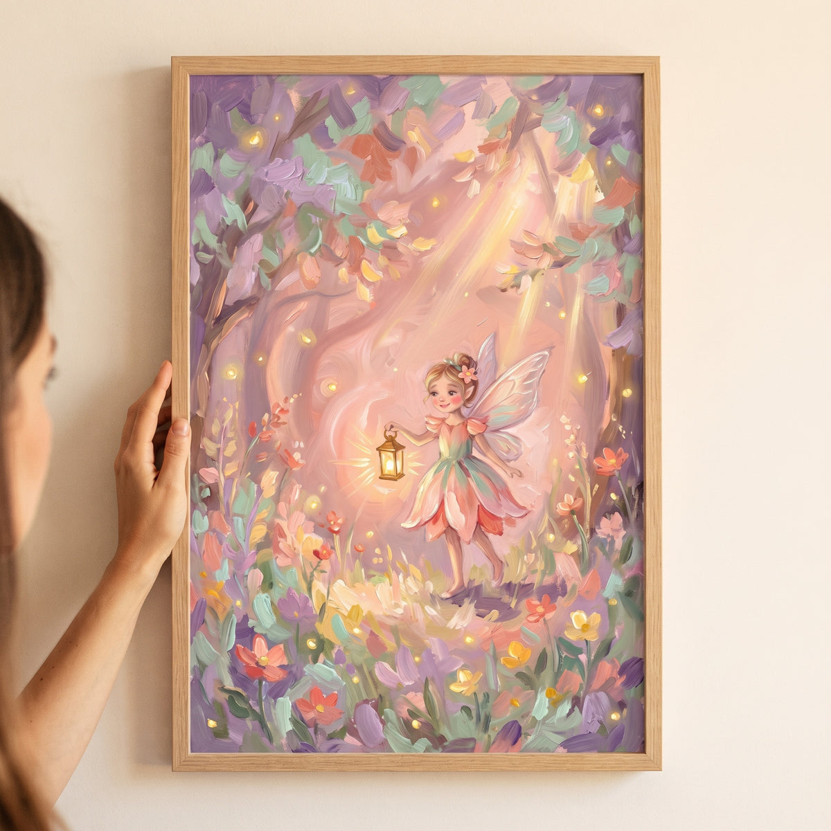 A small winged fairy holds a light in a whimsical pastel forest in this glowing gold lantern fairy wall art.