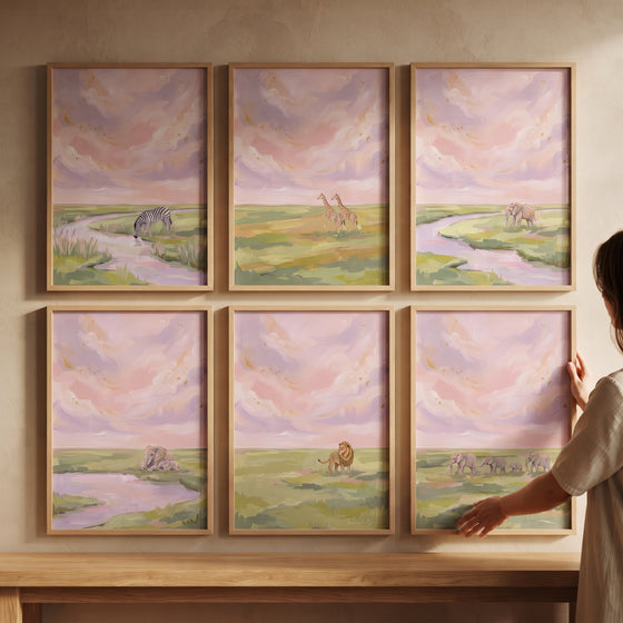 Gold shimmer safari animals wall art set of 6 features giraffes, zebras, and elephants in soft pastel sunset landscapes.