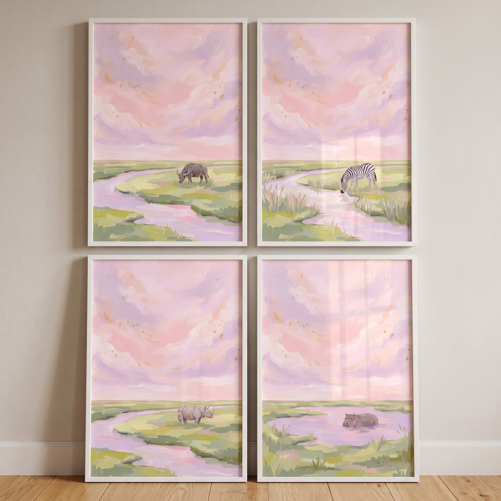 Gold speckled savanna animals wall art set of 4 with a buffalo, zebra, rhino, and hippo in pink and purple landscapes.