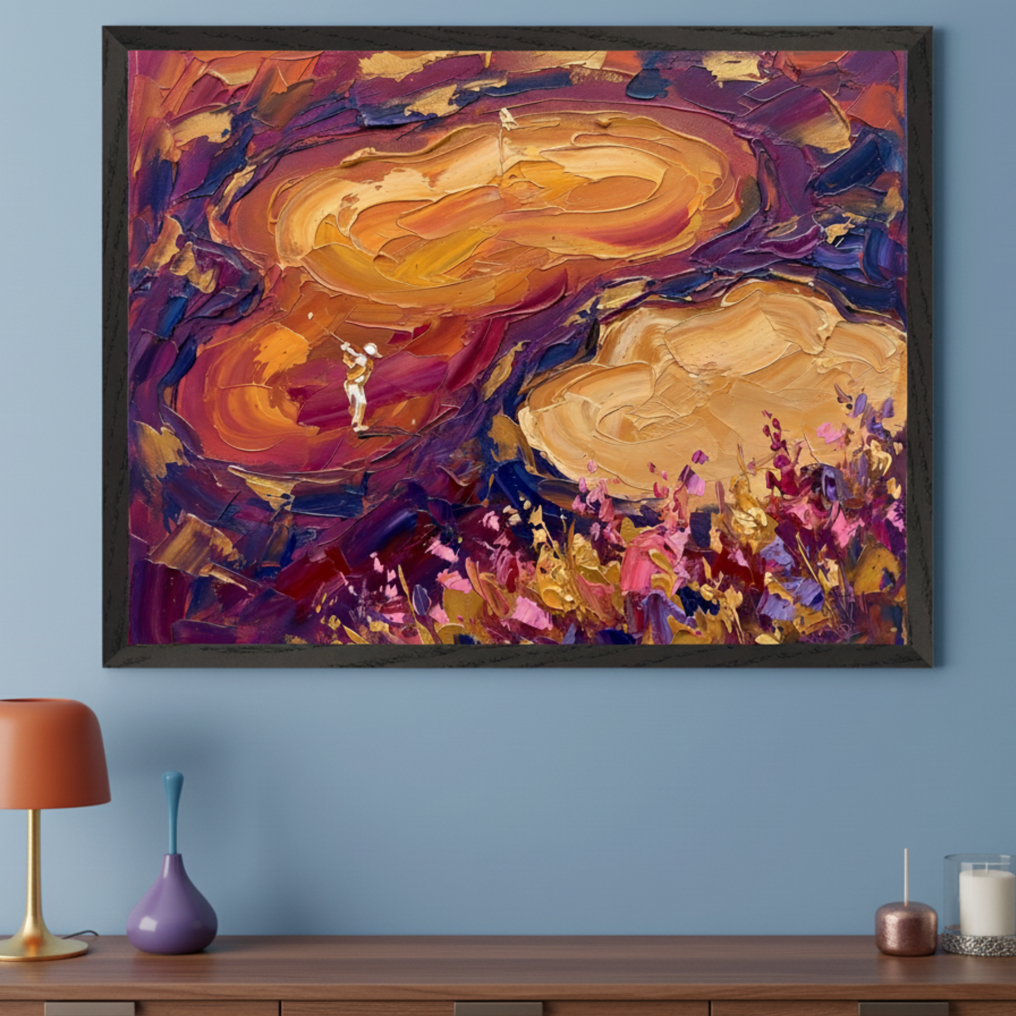 Modern room with a wooden dresser. A large framed, abstract impasto painting depicting miniature golfers on vibrant orange and yellow mounds with purple surroundings, hangs centered above the dresser.