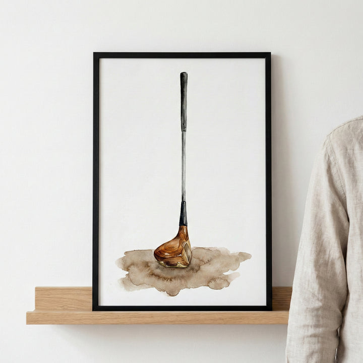 Minimalist watercolor painting of a single vintage golf club with a wooden head, standing upright on a light background with a splash of earthy tones beneath it. Suitable for golf enthusiasts of all ages.