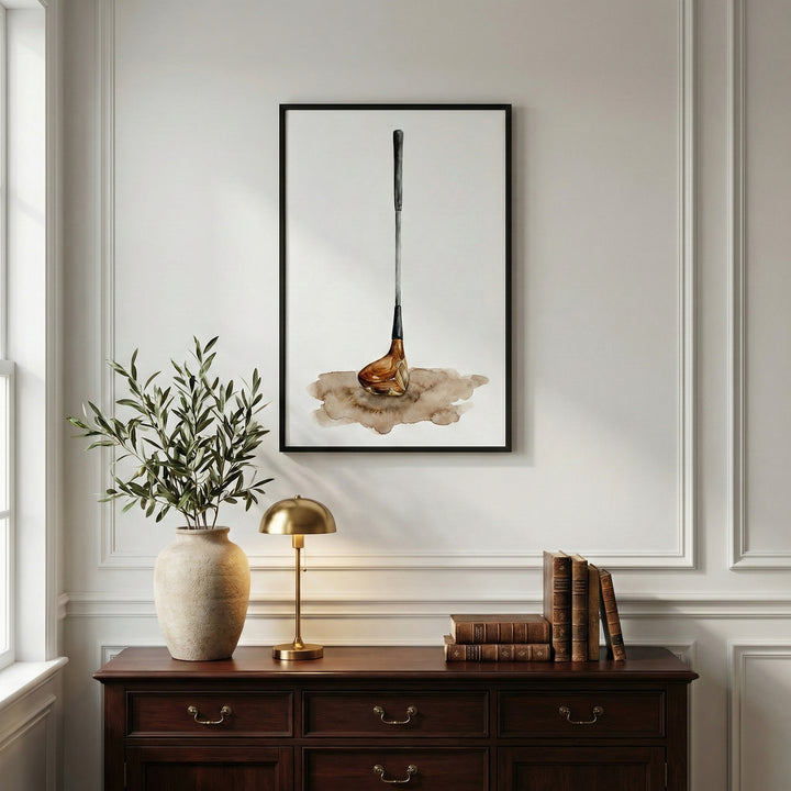 Framed artwork of a golf club in a traditional interior setting, emphasizing the club’s elegant form and classic wooden head. A refined decorative piece appealing to golf lovers of all ages.