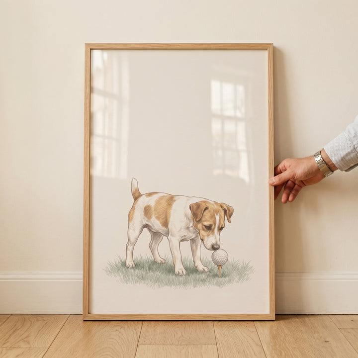 Golfing jack russell terrier dog wall art in a wooden frame, featuring a dog looking down at a golf ball on a tee.