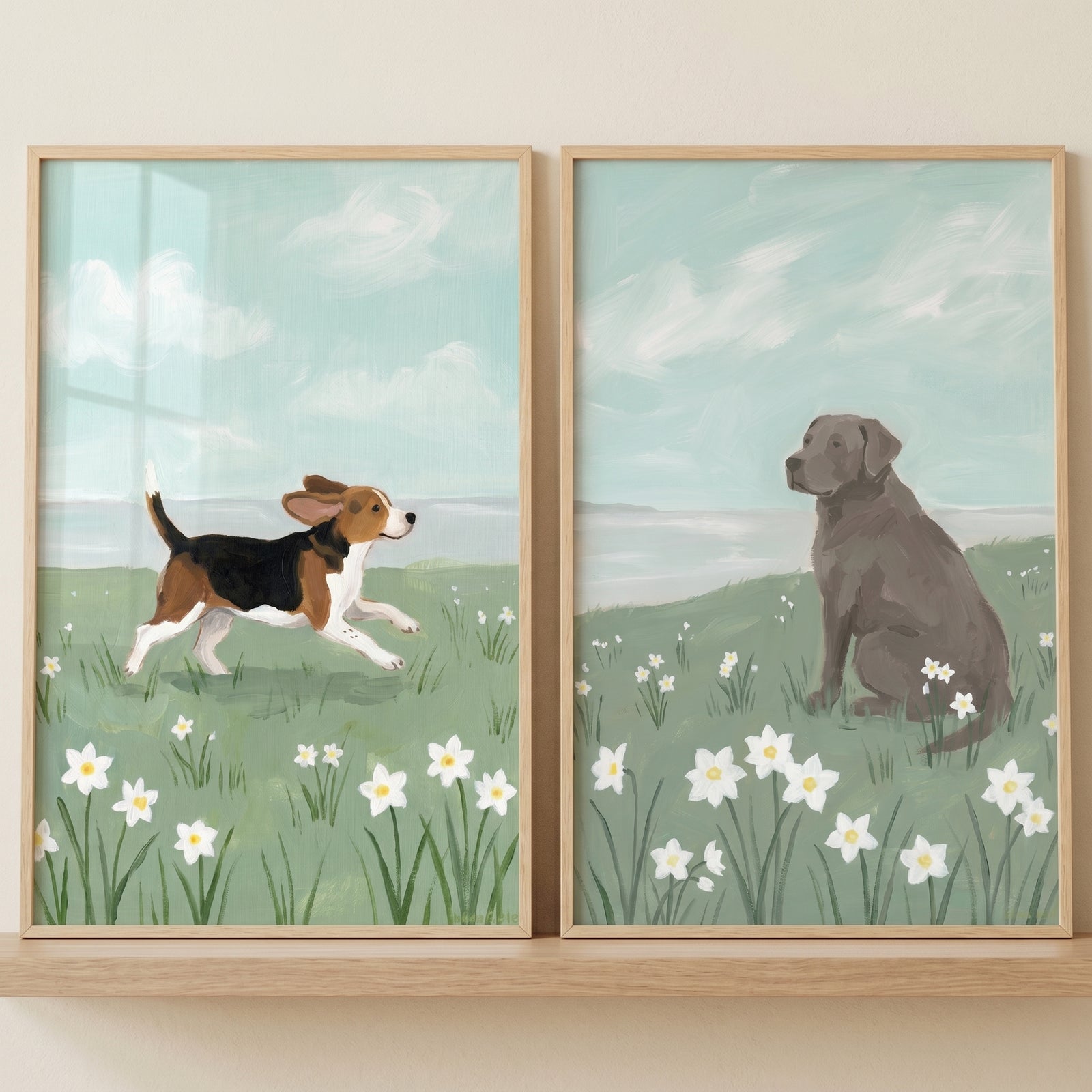 Grandmillennial spring meadow dogs wall art set of 2 features a running beagle and sitting labrador in flower fields.