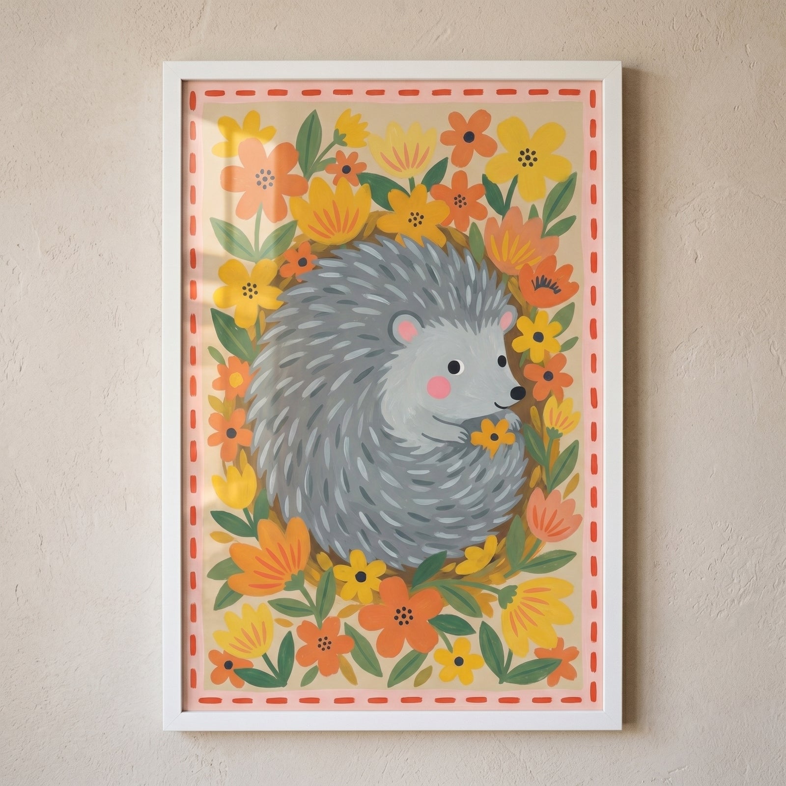 Gray holding flower hedgehog wall art with yellow and orange floral patterns, displayed in a white frame on a tan wall.