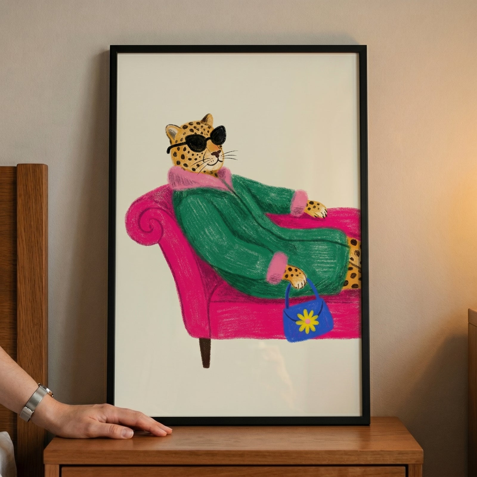 Green fur coat leopard artwork features a leopard in sunglasses lounging on a pink sofa with a blue daisy handbag.