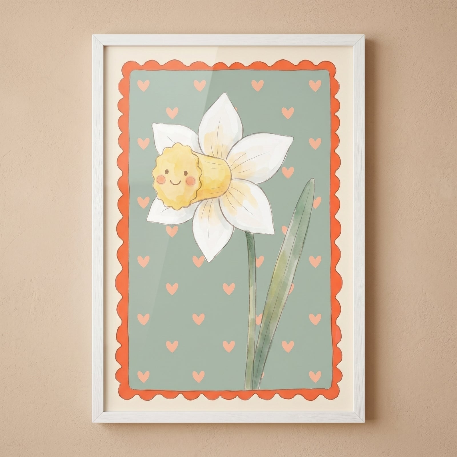 Green stem white daffodil flower wall art with a smiling face, pink hearts, and orange border in a white frame.