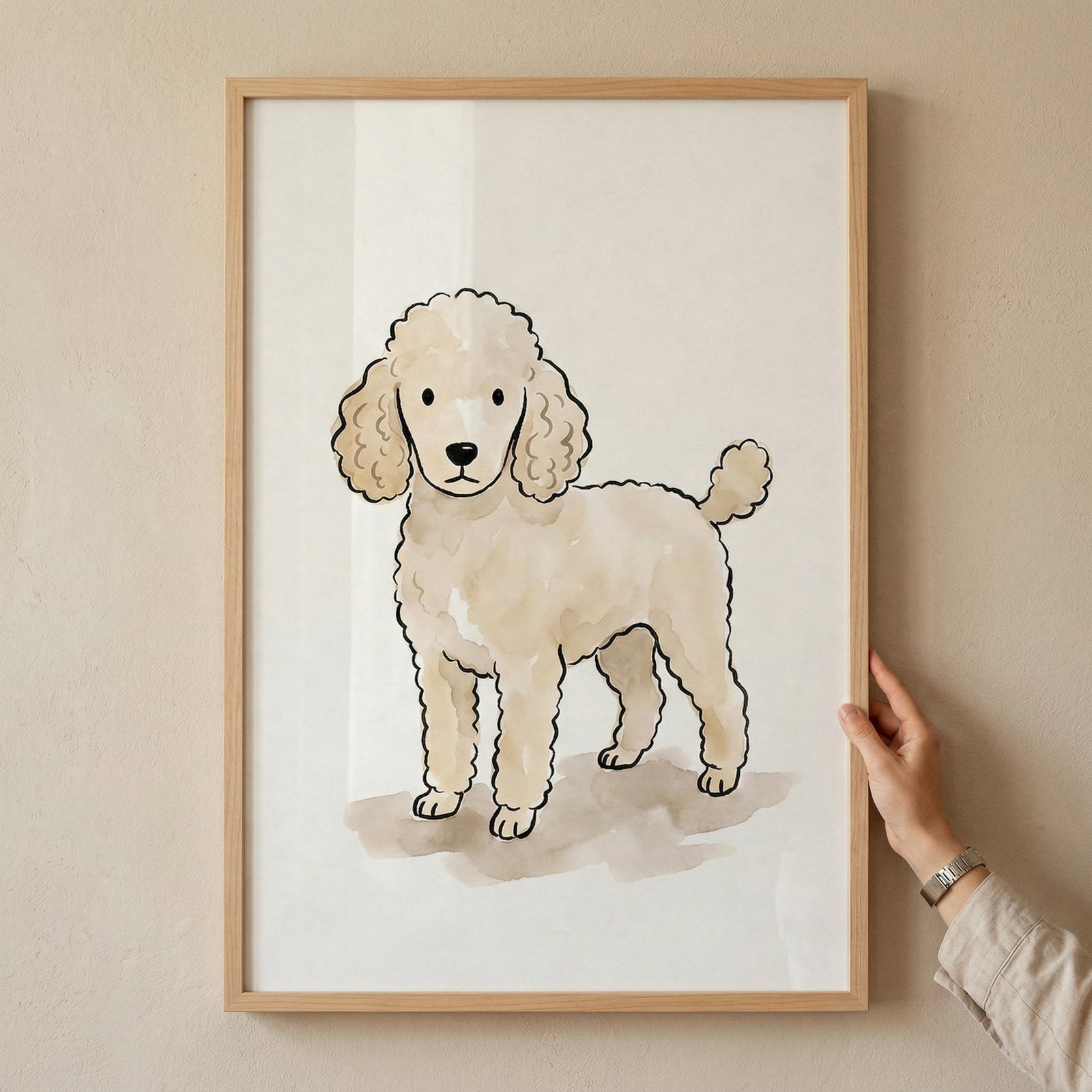 A framed illustration of a light beige poodle stands against a plain white background. The dog features curly fur on its head, ears, and small tail, with simple black outlines and soft, colored washes. A subtle shadow is beneath its feet. 