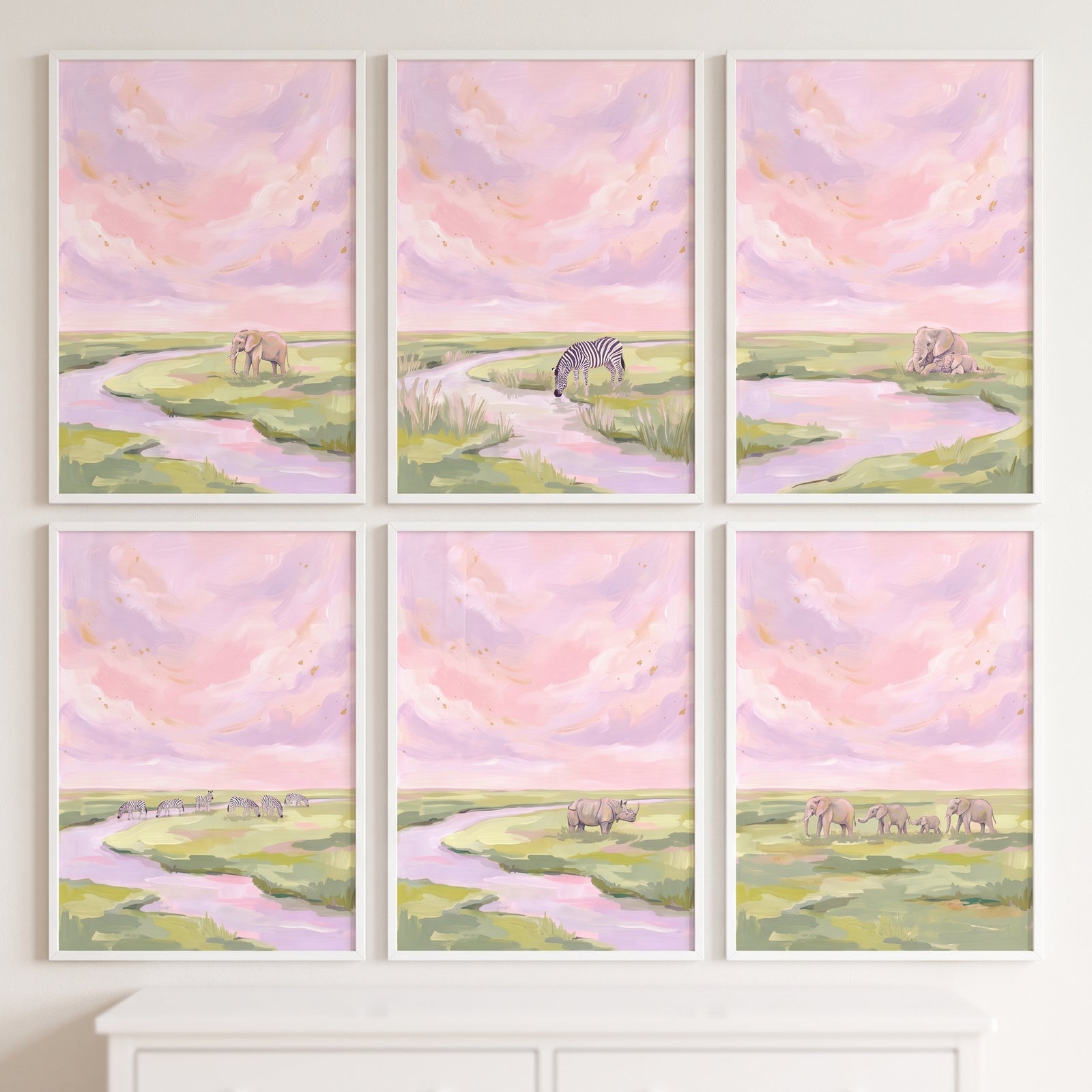 Hazy pink savanna animals wall art set of 6 depicts elephants, zebras, and a rhino by a river under a soft pastel sky.