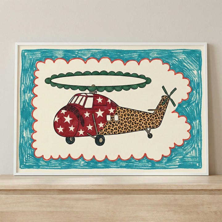 Close-up view of framed helicopter illustration wall art featuring a star-spangled front and leopard-print tail, bordered by bright crayon-like textures. The playful design adds a pop of personality and charm to any wall display.