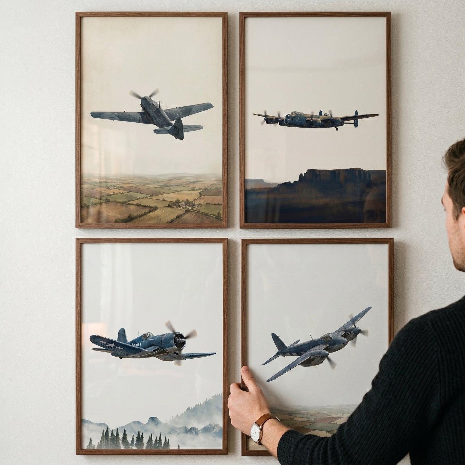 A man adjusts a historical flight military plane wall art set of 4 featuring vintage combat aircraft in wooden frames.