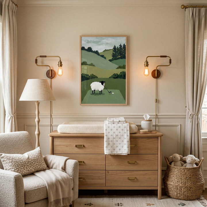 A cozy beige nursery featuring a dresser, armchair, and holding golf club sheep wall art hanging on the wall.