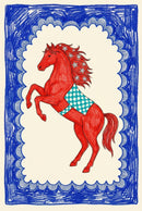 Whimsical illustration of a red horse rearing up with star details in its mane and a blue geometric-patterned saddle, framed by a bold hand-drawn blue border.