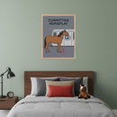 Modern bedroom with a wooden headboard bed. Above the bed hangs a framed cartoon print of a brown horse spray-painting a subway car. Text on the art reads "COMMITTING HORSEPLAY." A nightstand with a lamp is left, and a horse plush is on the bed.