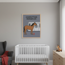 Modern nursery with a white crib, gray armchair, and wood dresser with a plush horse. A framed cartoon print of a horse spray-painting a subway car with "COMMITTING HORSEPLAY" hangs on the gray wall above the crib.