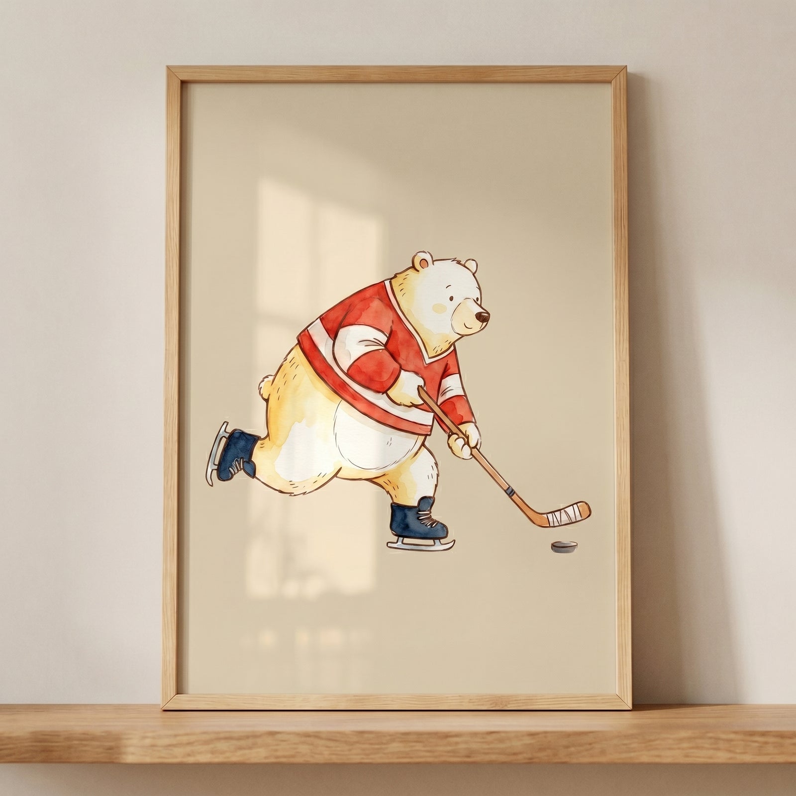 Framed ice hockey bear wall art shows a watercolor cartoon polar bear in a red jersey skating after a hockey puck.