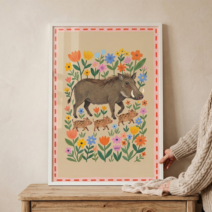 Illustrative floral garden boar wall art shows a large boar and three piglets walking through colorful flowers.