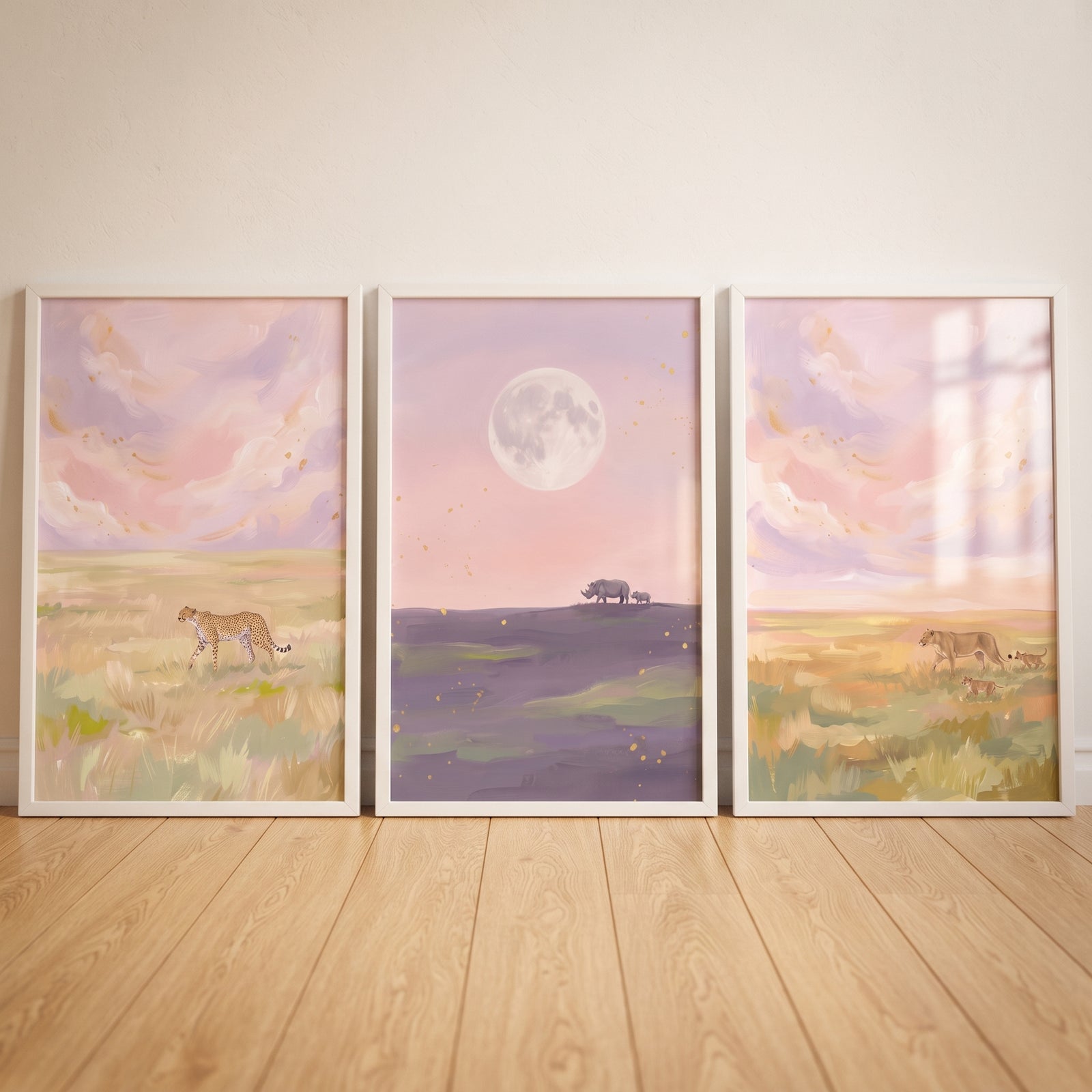 Impasto mauve safari animals wall art set of 3 showing a cheetah, rhino, and lion family in framed pastel landscapes.