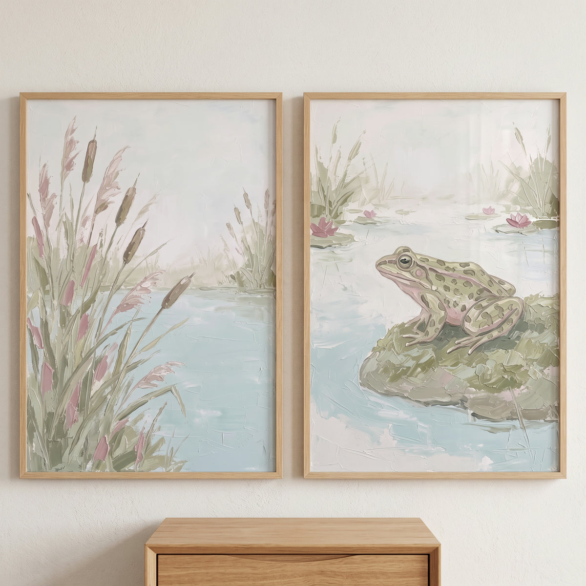 Impasto muted marsh nature artwork set of 2 depicts a green frog on a rock and tall cattails beside pale blue water.