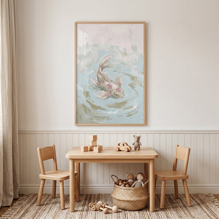 Wooden play table and chairs below impasto textured koi fish wall art in a neutral-toned, minimalist nursery.