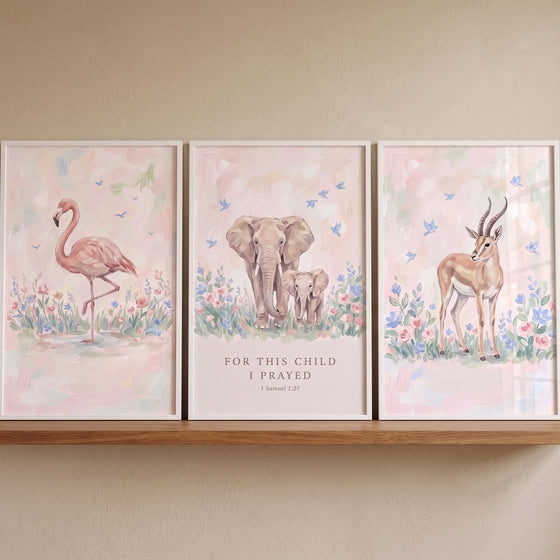 Impressionist blush pink safari animals artwork set of 3 featuring a flamingo, elephants, and a gazelle in pastel flowers.