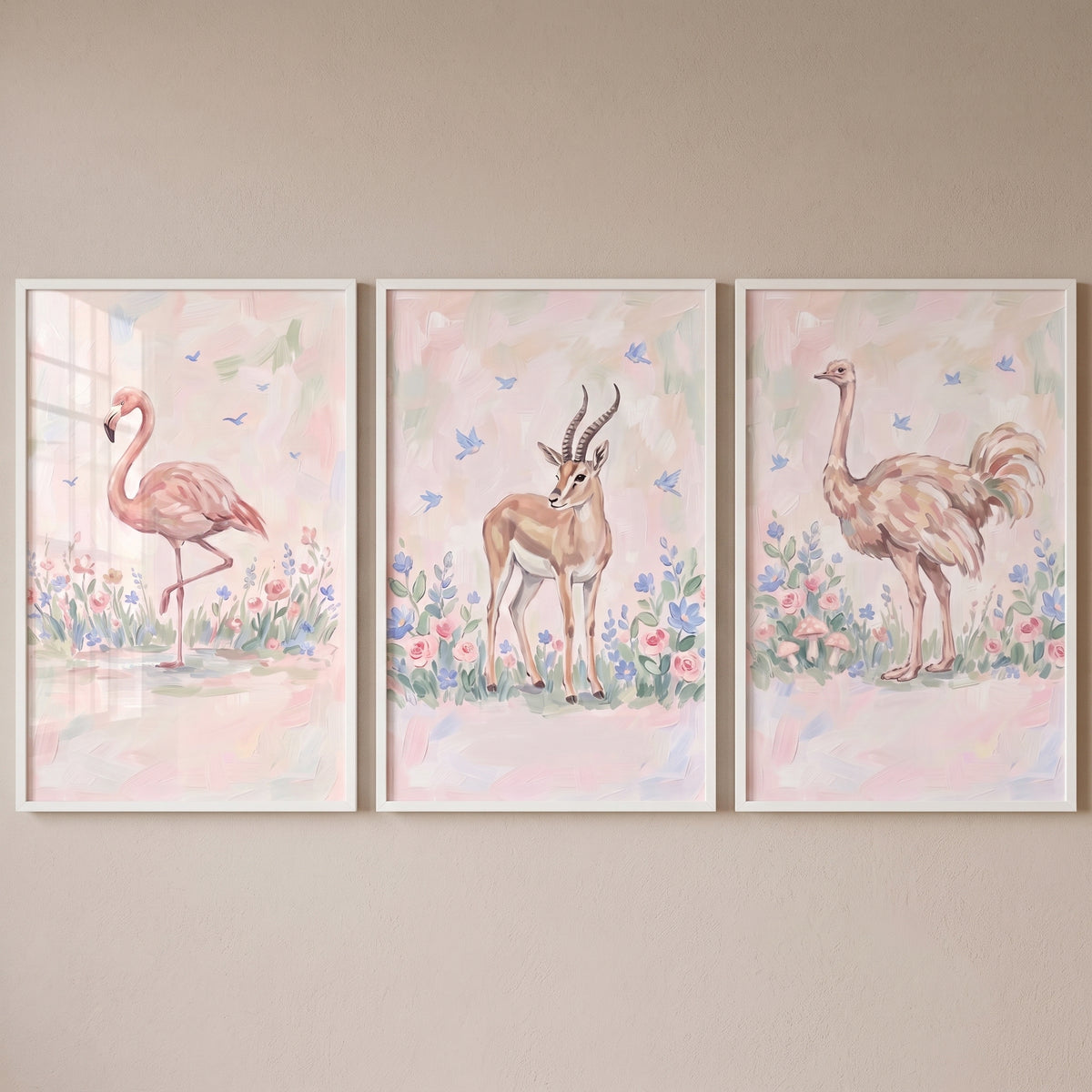 Impressionist meadow safari animals wall art set of 3 featuring a flamingo, a gazelle, and an ostrich in white frames.